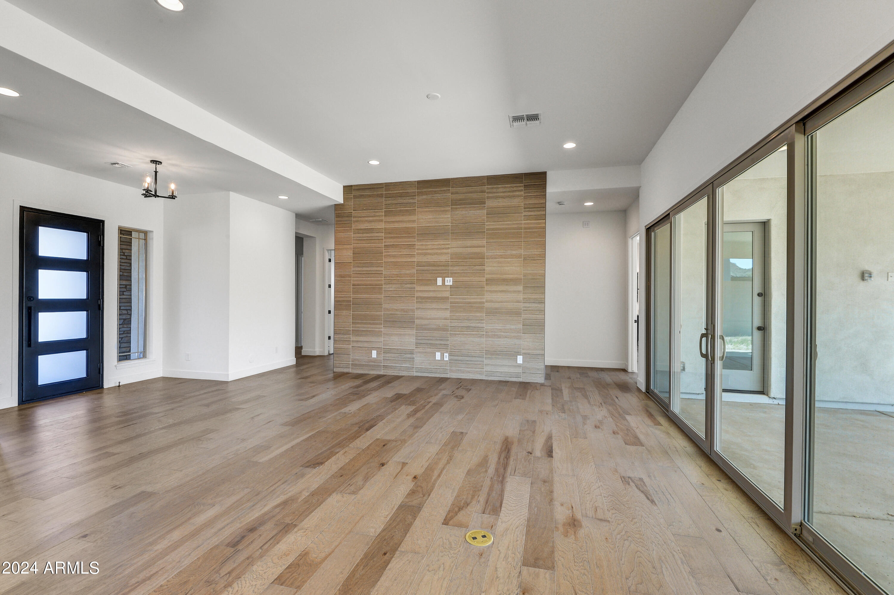 20717 West Rattler Road Buckeye, AZ 85396 - Photo 13 of 30 wooden floor in an empty room with a window