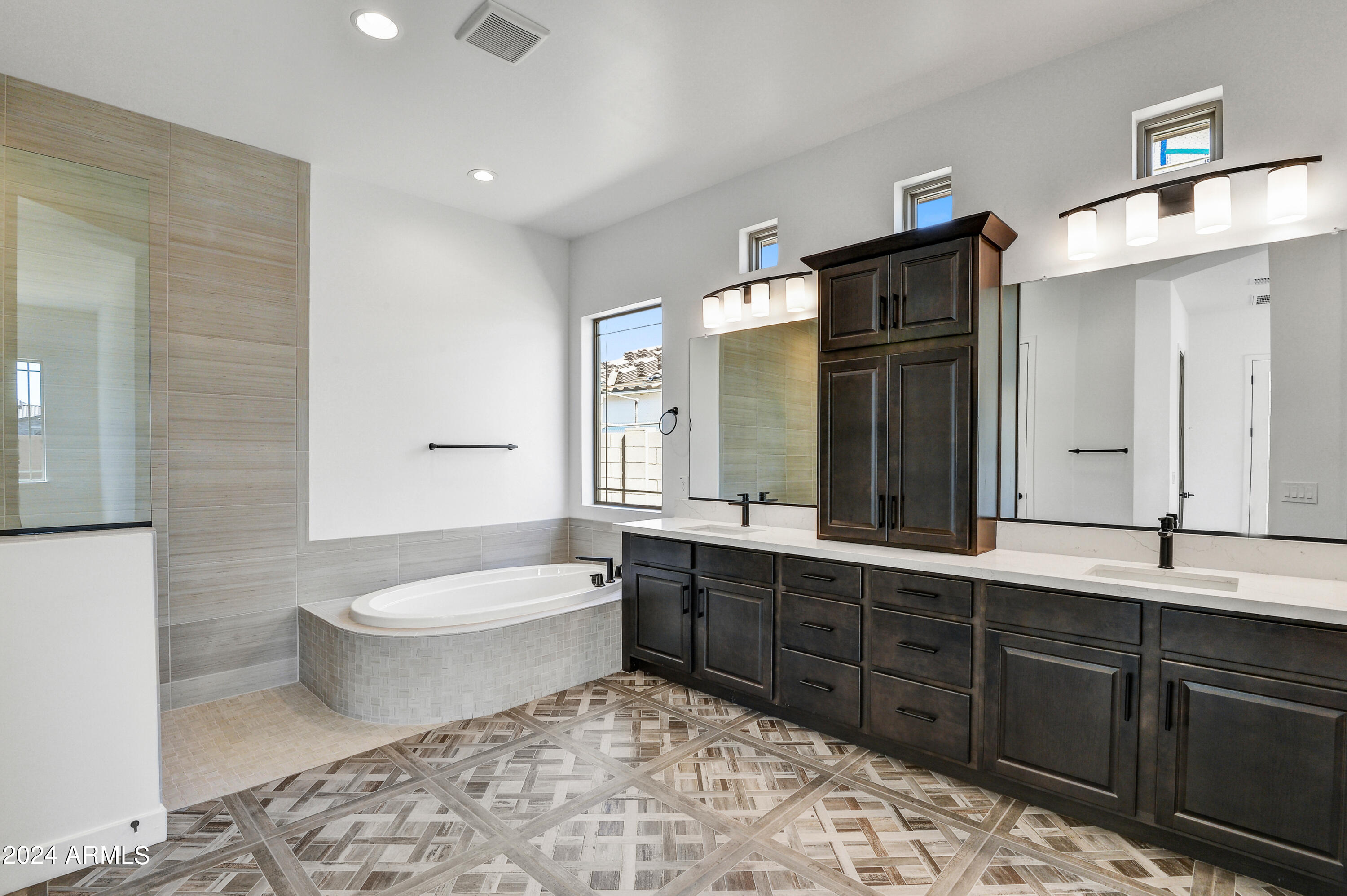 20717 West Rattler Road Buckeye, AZ 85396 - Photo 15 of 30 a bathroom with a sink a toilet and bathtub