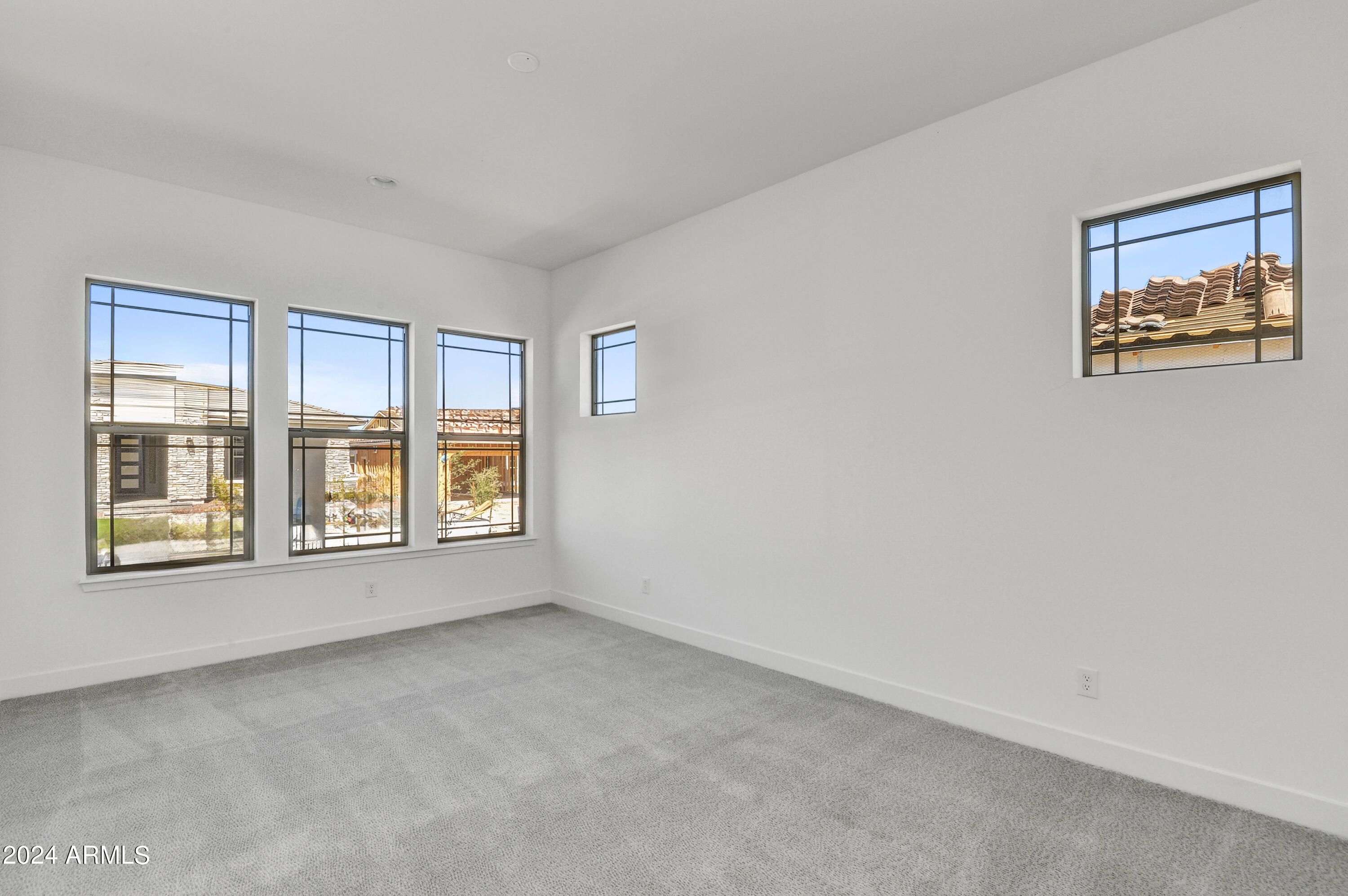20717 West Rattler Road Buckeye, AZ 85396 - Photo 18 of 30 a view of an empty room with a window