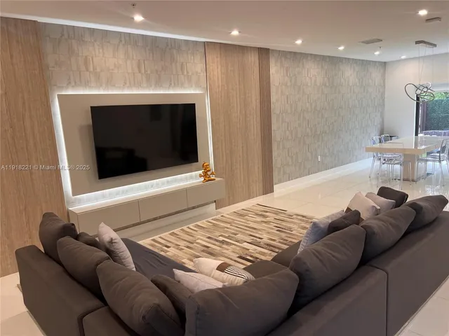 a bedroom with a bed and a fireplace