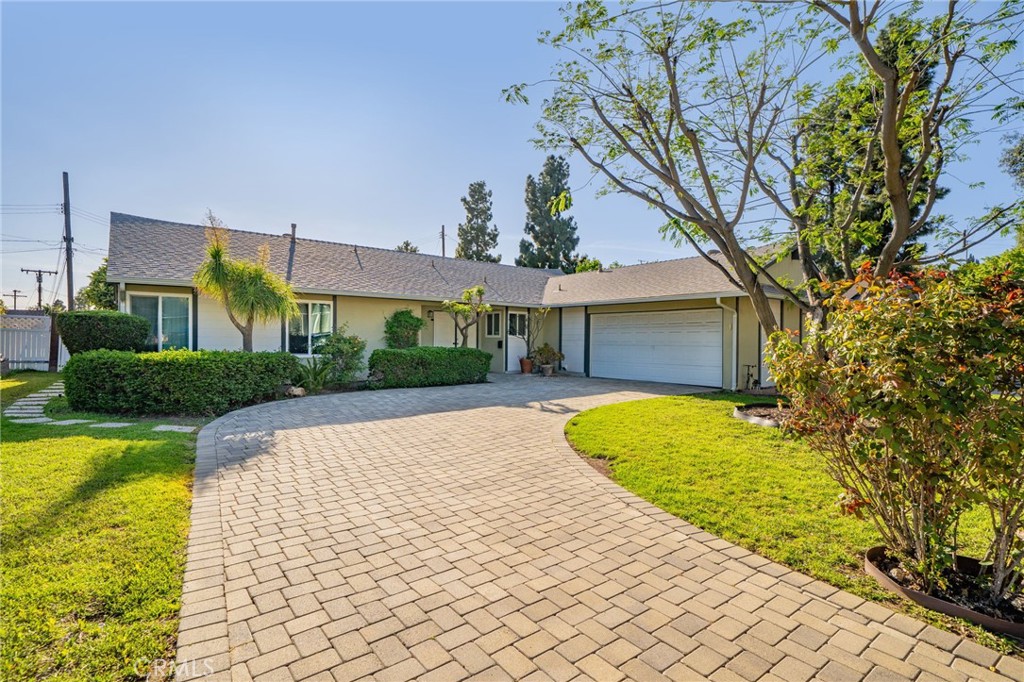 211 Benicia Road Diamond Bar, CA 91765 - Photo 1 of 24 a house with swimming pool in front of it
