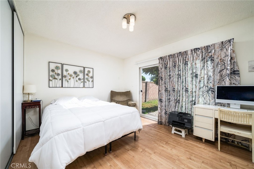 211 Benicia Road Diamond Bar, CA 91765 - Photo 11 of 24 a bedroom with a bed and a flat screen tv
