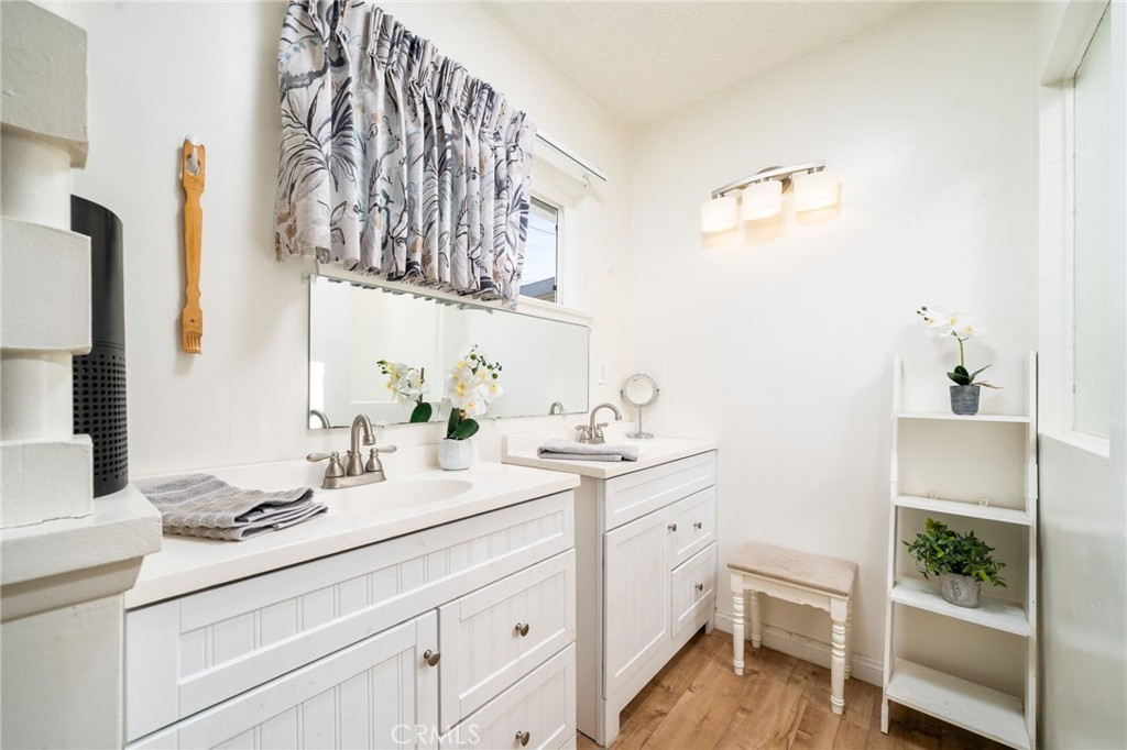 211 Benicia Road Diamond Bar, CA 91765 - Photo 12 of 24 a bathroom with a sink and a mirror
