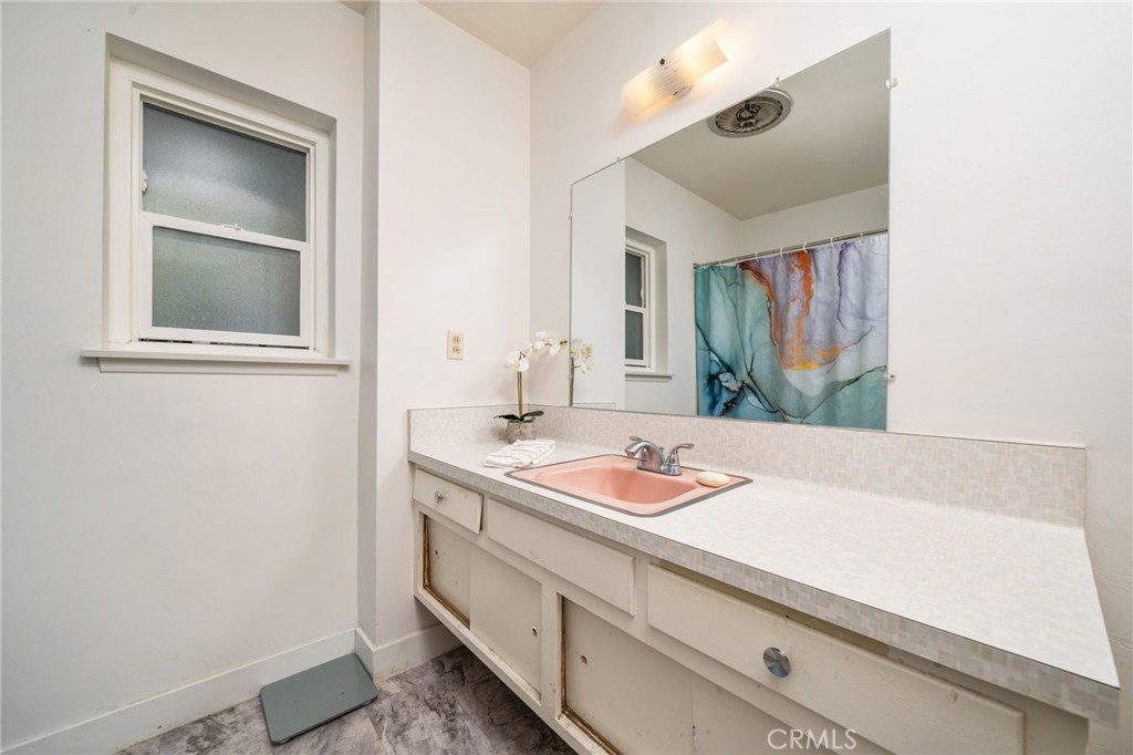 211 Benicia Road Diamond Bar, CA 91765 - Photo 16 of 24 a bathroom with a sink and a mirror