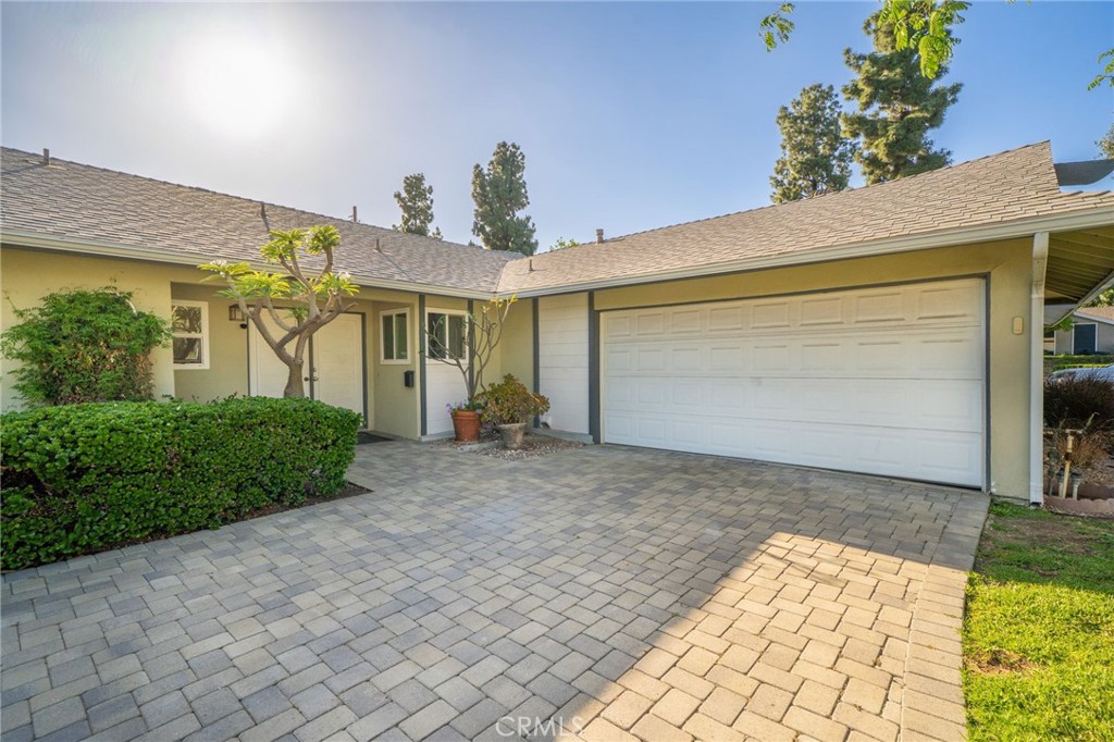 211 Benicia Road Diamond Bar, CA 91765 - Photo 2 of 24 a view of a house with a yard and potted plants