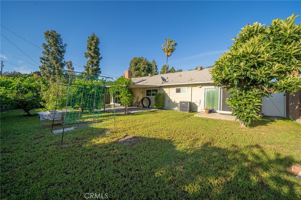 211 Benicia Road Diamond Bar, CA 91765 - Photo 21 of 24 a front view of a house with garden