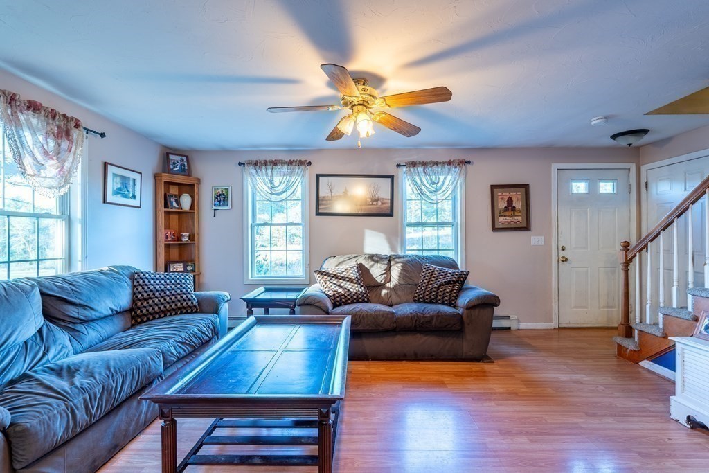 74 Katrina Road Middleboro, MA 02346 - Photo 12 of 37 a living room with furniture a ceiling fan and a window