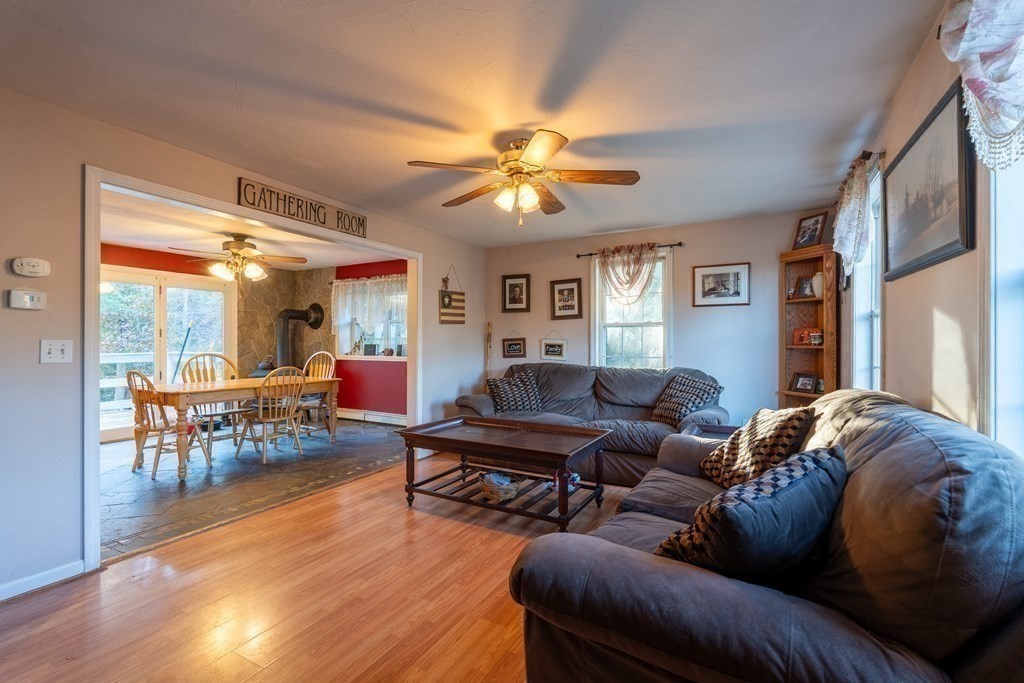 74 Katrina Road Middleboro, MA 02346 - Photo 13 of 37 a living room with furniture and wooden floor