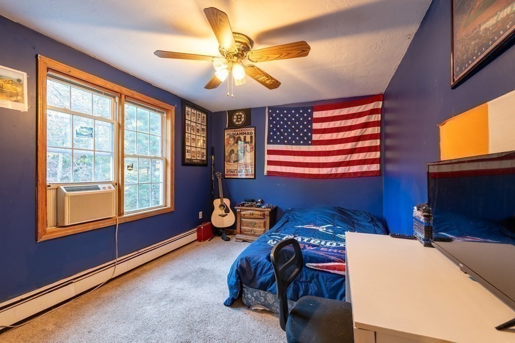 74 Katrina Road Middleboro, MA 02346 - Photo 22 of 37 a bedroom with a bed and balcony view