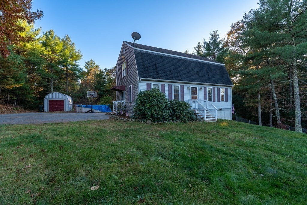 74 Katrina Road Middleboro, MA 02346 - Photo 3 of 37 a view of a house with backyard and garden