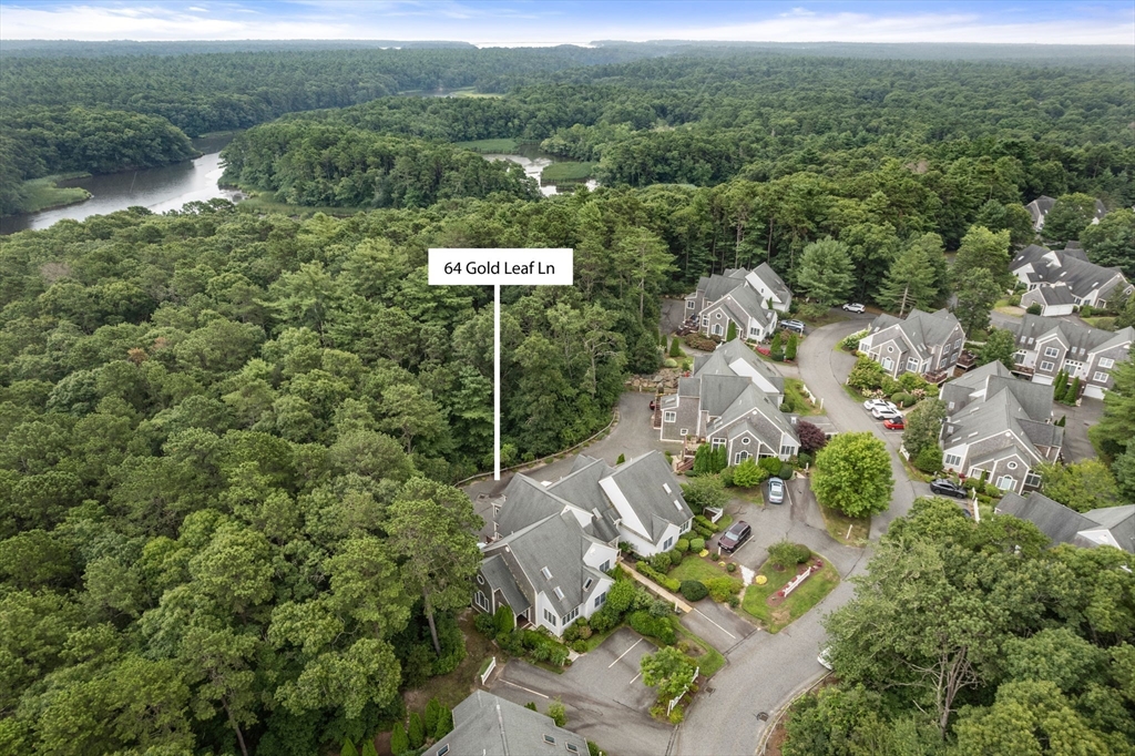 64 Gold Leaf Lane, Unit 64 Mashpee, MA 02649 - Photo 2 of 38 an aerial view of residential house with outdoor space