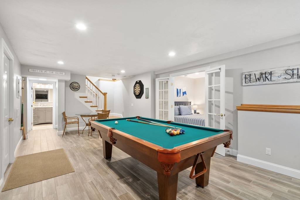 64 Gold Leaf Lane, Unit 64 Mashpee, MA 02649 - Photo 25 of 38 a room with pool table air hockey table and arcade game machine