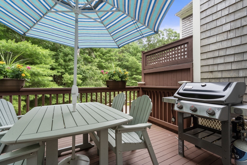 64 Gold Leaf Lane, Unit 64 Mashpee, MA 02649 - Photo 33 of 38 a view of a balcony with furniture