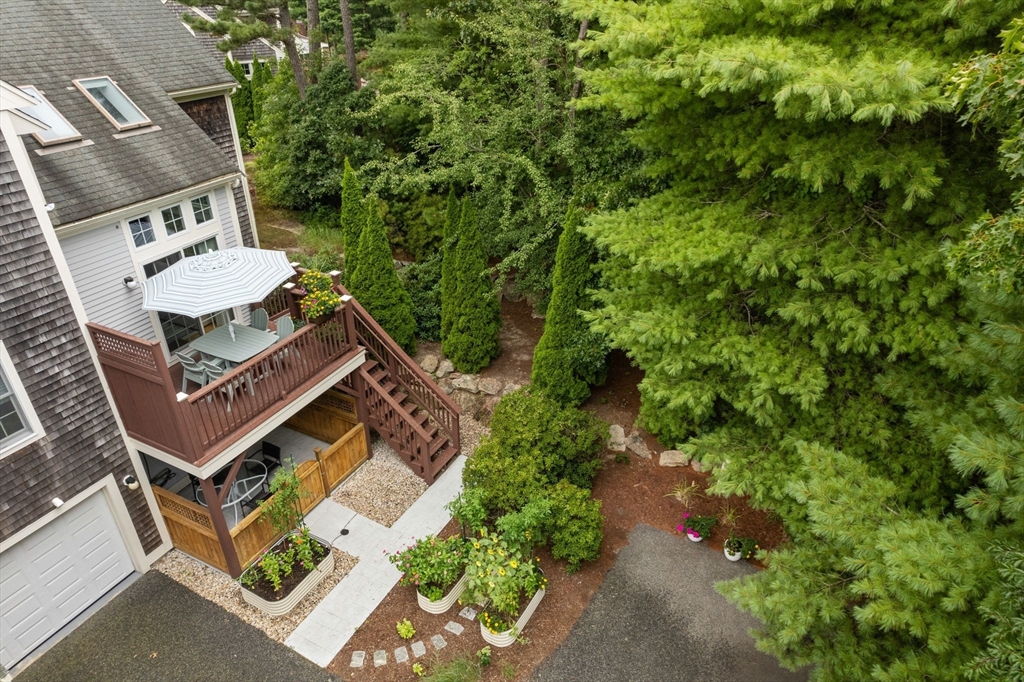64 Gold Leaf Lane, Unit 64 Mashpee, MA 02649 - Photo 35 of 38 an aerial view of a house with a yard