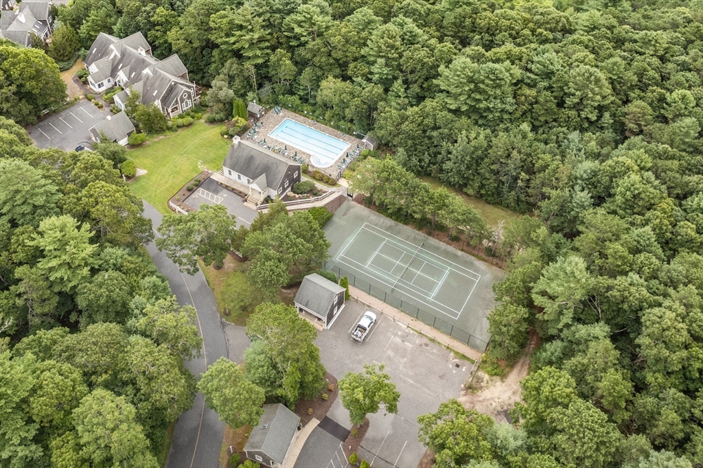64 Gold Leaf Lane, Unit 64 Mashpee, MA 02649 - Photo 37 of 38 an aerial view of a house with outdoor space and street view