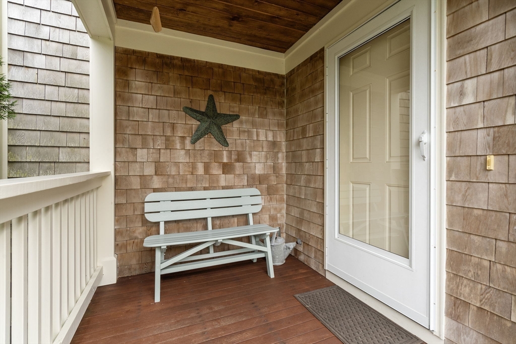 64 Gold Leaf Lane, Unit 64 Mashpee, MA 02649 - Photo 5 of 38 a view of outdoor space with porch
