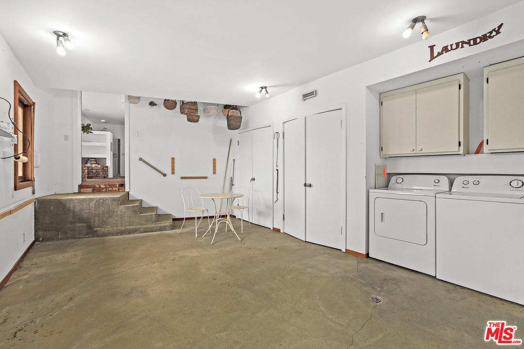 3762 Alta Mesa Drive Studio City, CA 91604 - Photo 19 of 33 a view of a livingroom with wooden cabinets