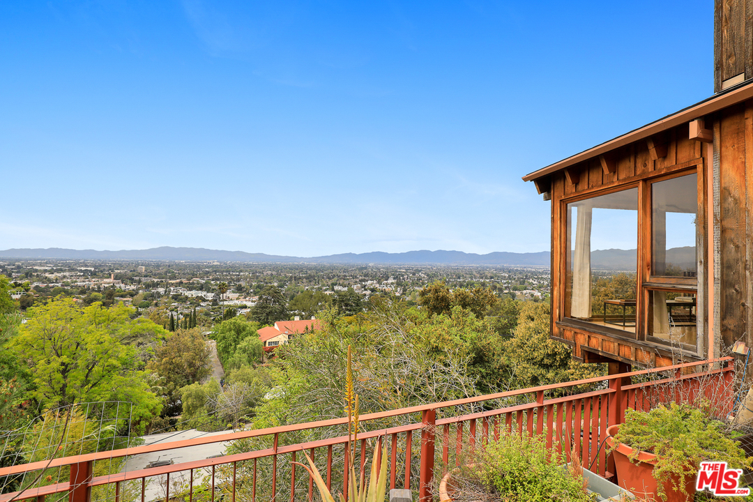 3762 Alta Mesa Drive Studio City, CA 91604 - Photo 3 of 33 a view of a city from a balcony