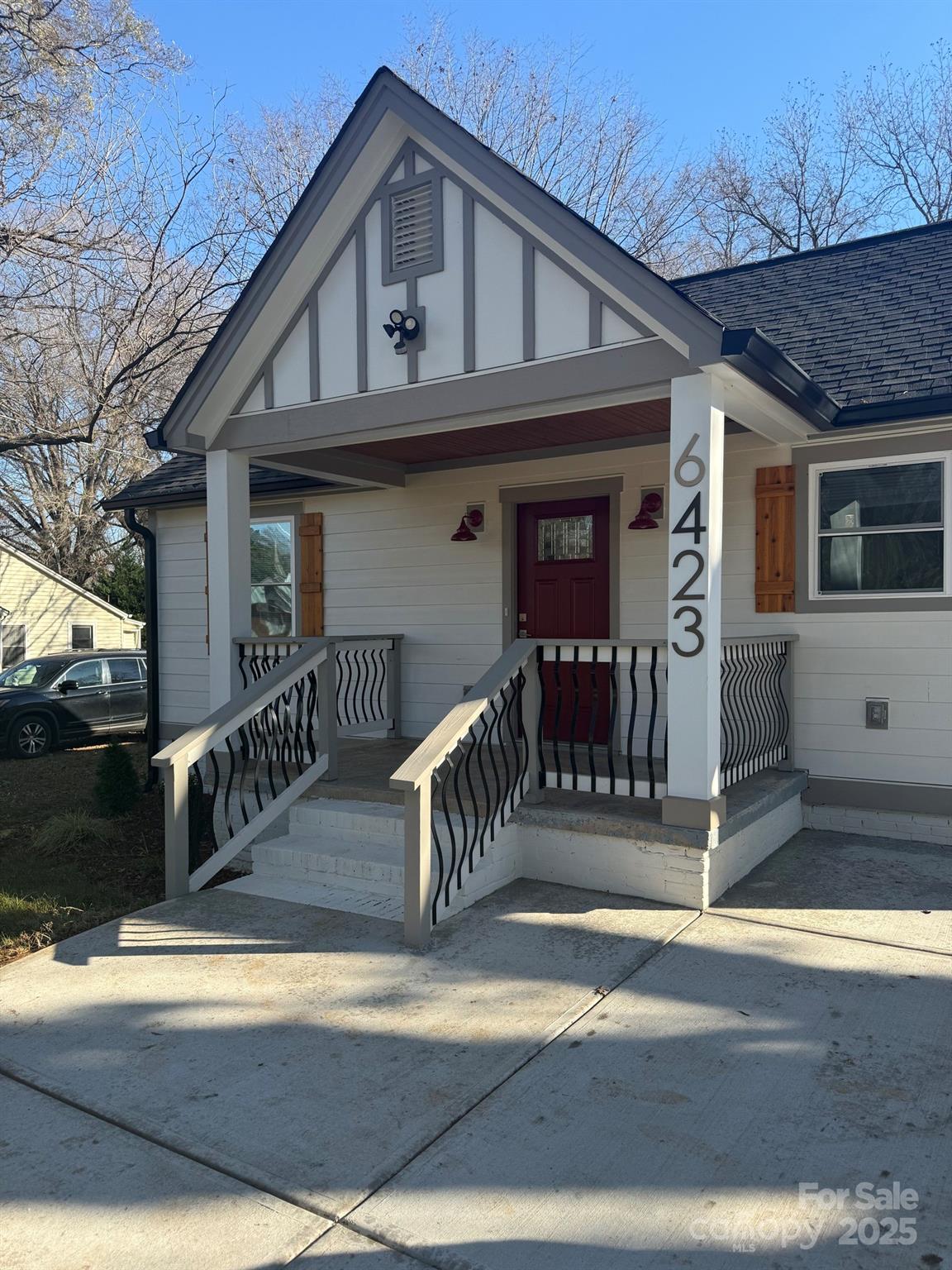 6423 South Tryon Street Charlotte, NC 28217 - Photo 23 of 28 a front view of a house with stairs