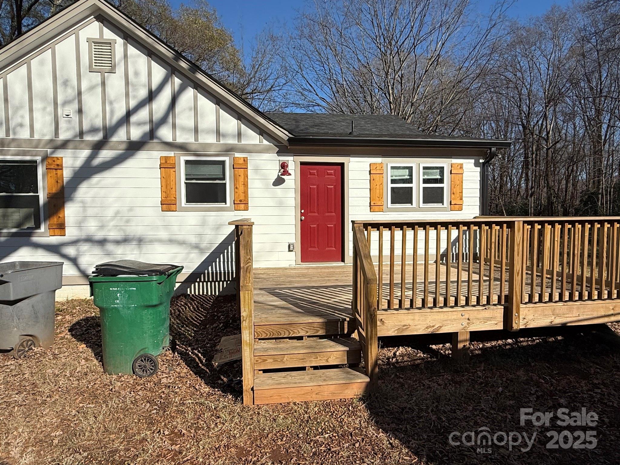 6423 South Tryon Street Charlotte, NC 28217 - Photo 27 of 28 a front view of a house with entryway