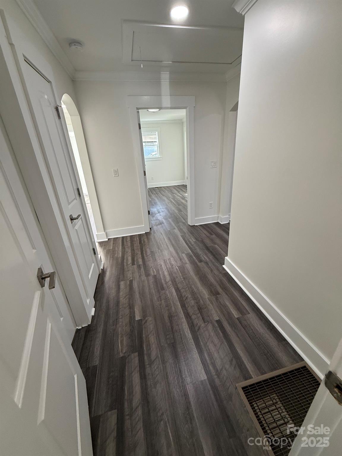 6423 South Tryon Street Charlotte, NC 28217 - Photo 6 of 28 a view of a room with wooden floor and staircase