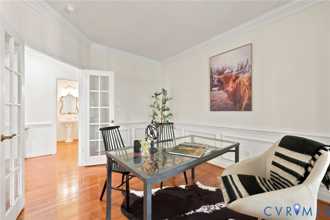 4701 Regal Oaks Road Glen Allen, VA 23059 - Photo 19 of 60 a view of a dining room with furniture and wooden floor