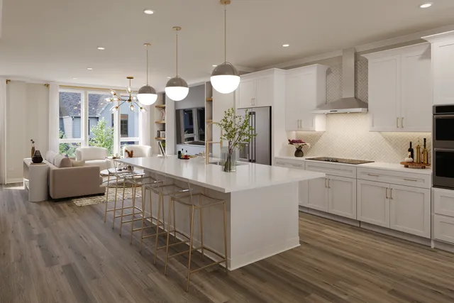 a kitchen with counter top space a sink cabinets and appliances