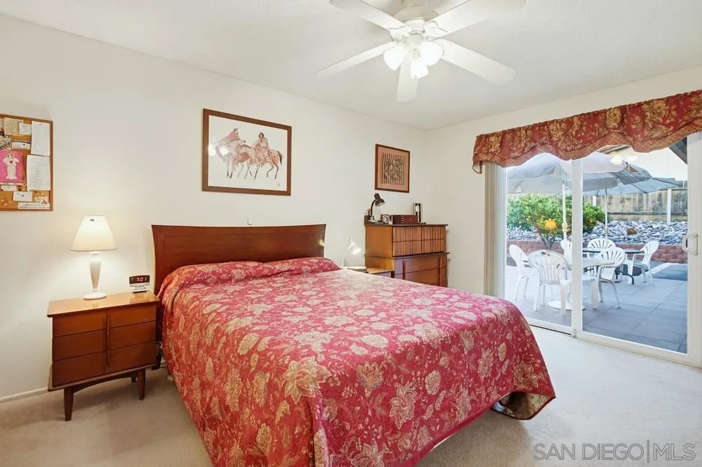 2164 Valley Mill Road El Cajon, CA 92020 - Photo 20 of 34 Opulent primary bedroom with view of sparkling pool and spa!