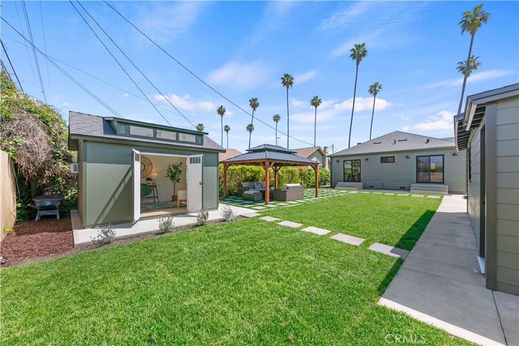 3937 2nd Avenue Los Angeles, CA 90008 - Photo 38 of 47 a front view of a house with a yard