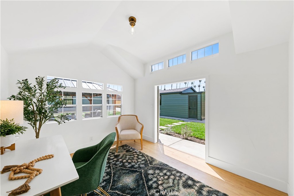 3937 2nd Avenue Los Angeles, CA 90008 - Photo 40 of 47 a living room with furniture and a large window