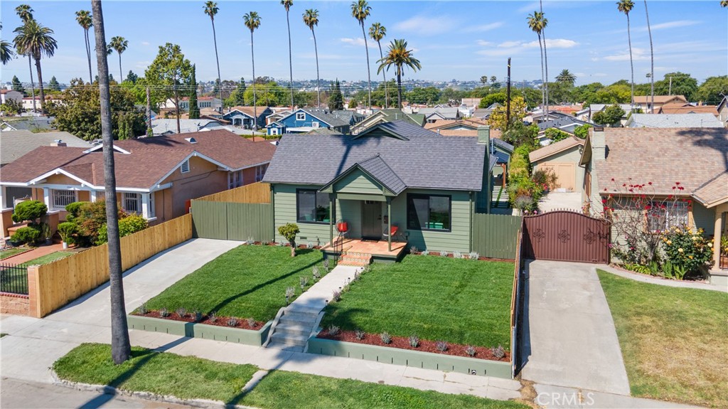 3937 2nd Avenue Los Angeles, CA 90008 - Photo 42 of 47 a aerial view of a house with garden and houses