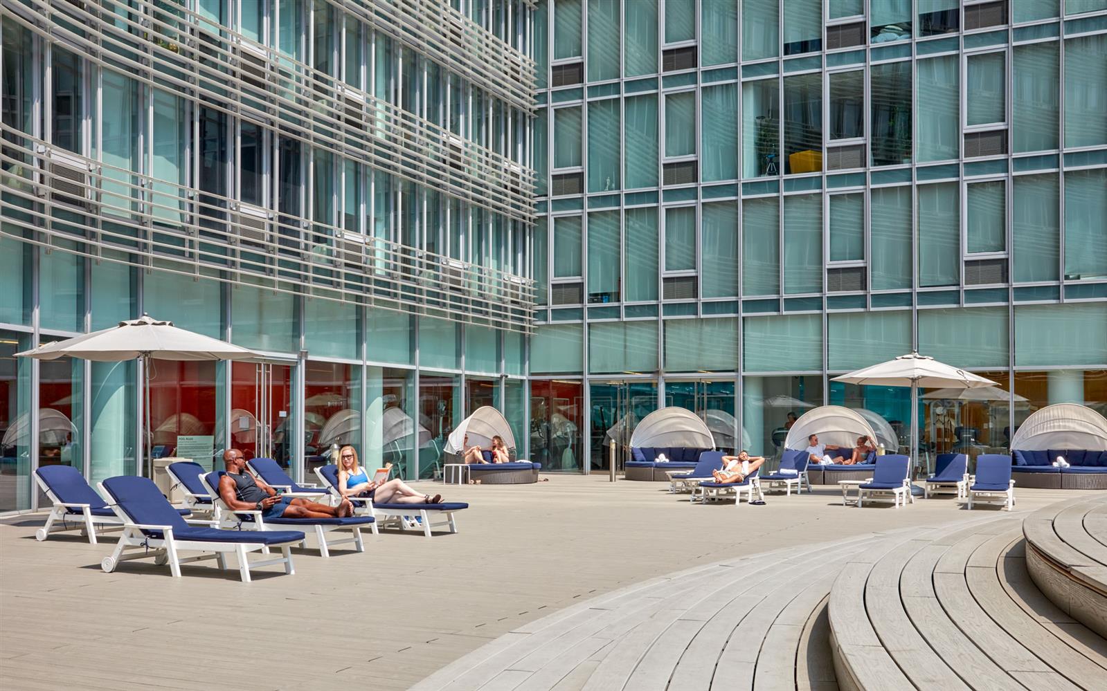 550 West 54th Street, Unit 952 Manhattan, NY 10019 - Photo 11 of 27 a group of cars parked in front of brick building