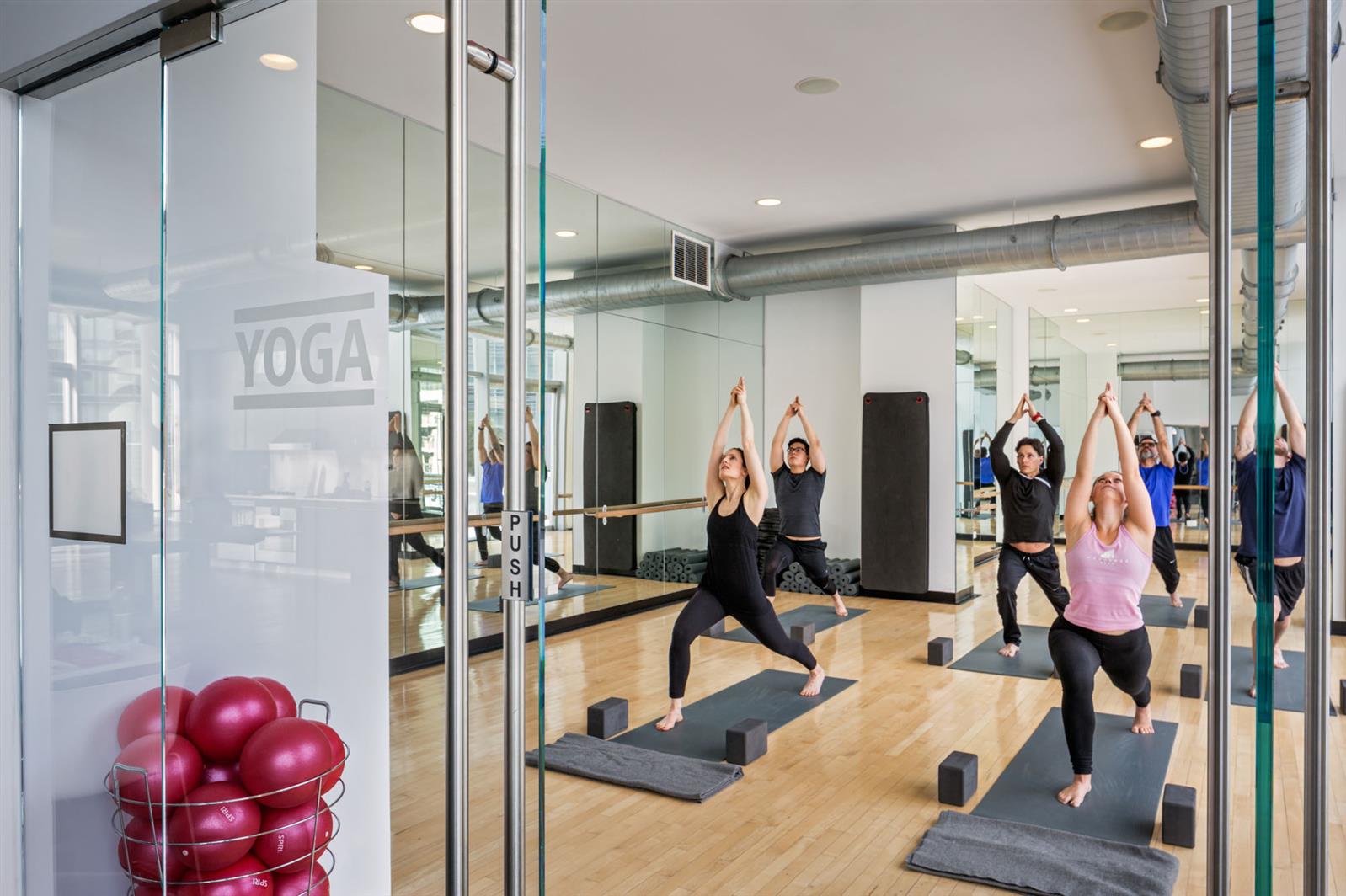 550 West 54th Street, Unit 952 Manhattan, NY 10019 - Photo 15 of 27 a view of a room with gym equipment