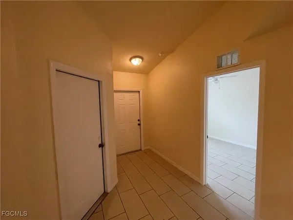 a view of hallway with a window