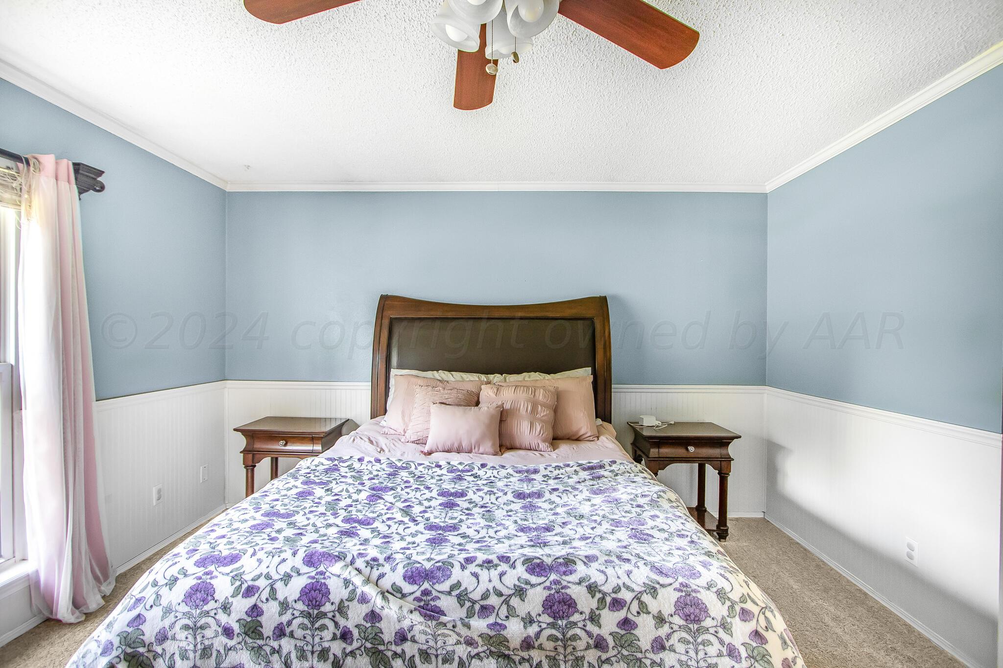 2208 Gresham Drive Amarillo, TX 79110 - Photo 15 of 31 a bedroom with a bed and a window