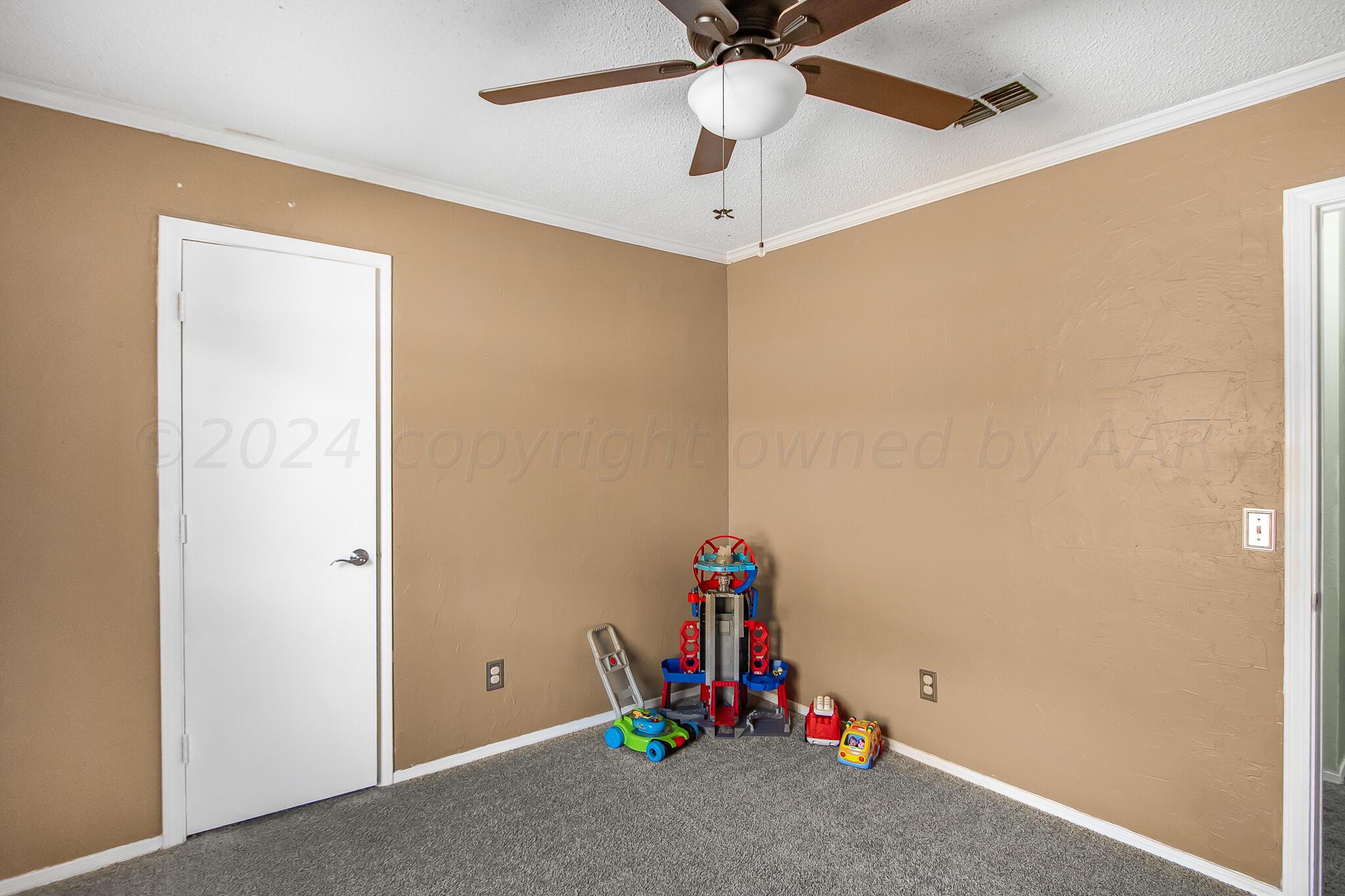 2208 Gresham Drive Amarillo, TX 79110 - Photo 20 of 31 a view of a room with gym equipment