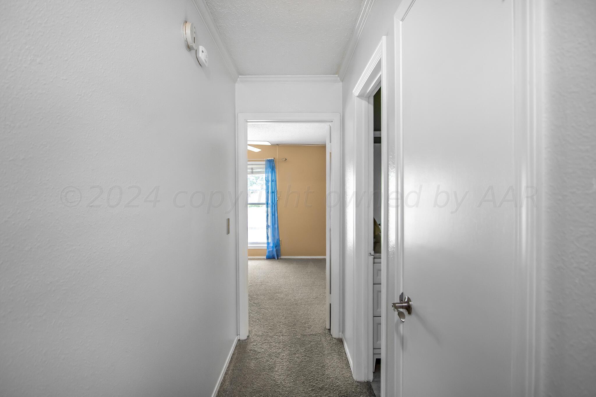 2208 Gresham Drive Amarillo, TX 79110 - Photo 25 of 31 a view of a bathroom from a hallway