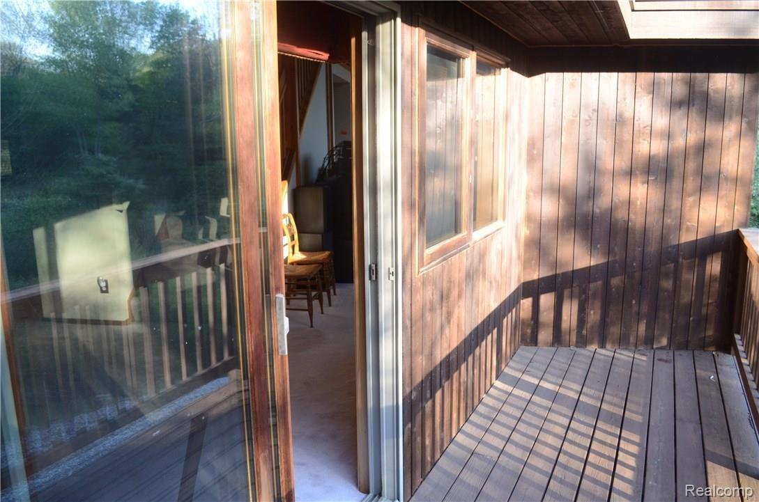 6976 Richardson Road Howell, MI 48843 - Photo 14 of 45 walk out deck