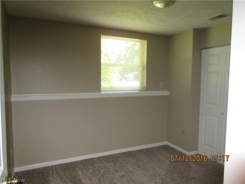 7645 Micawber Road Northeast Warren, OH 44484 - Photo 18 of 27 lower level bedroom 1