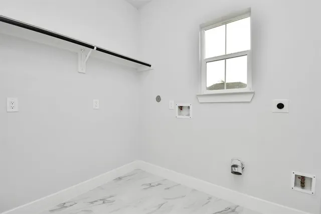 a view of small space with racks on the wall