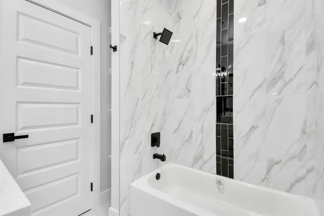 a bathroom with a bathtub