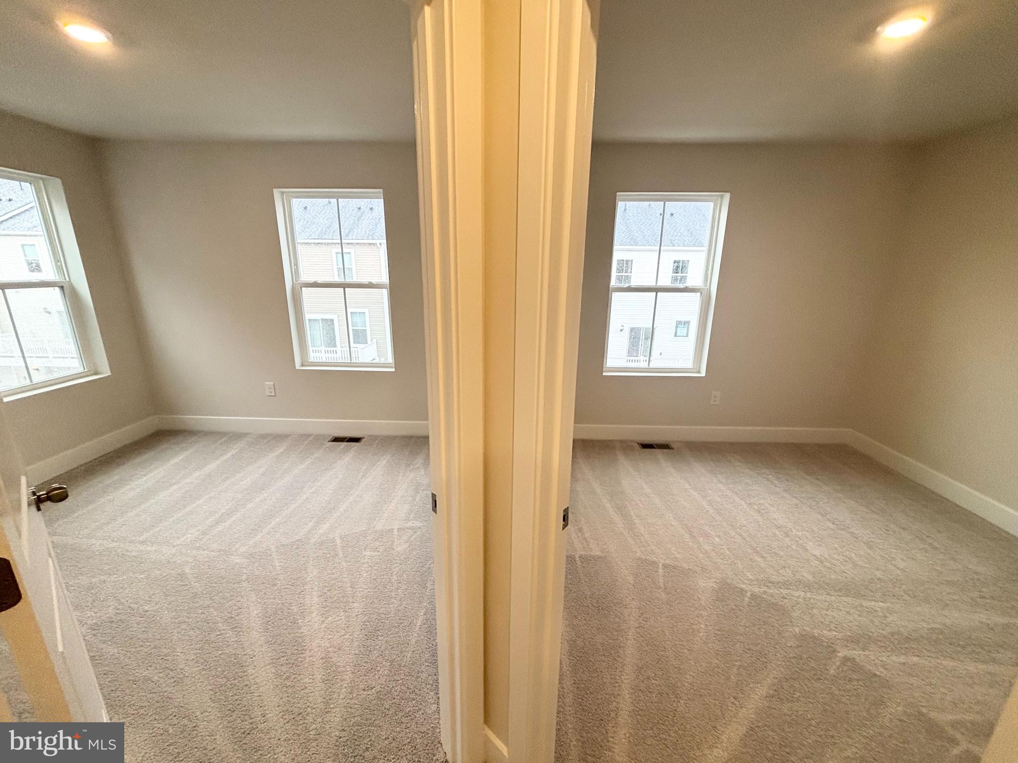 7260 Contee Road Laurel, MD 20707 - Photo 11 of 13 a view of an empty room with a window