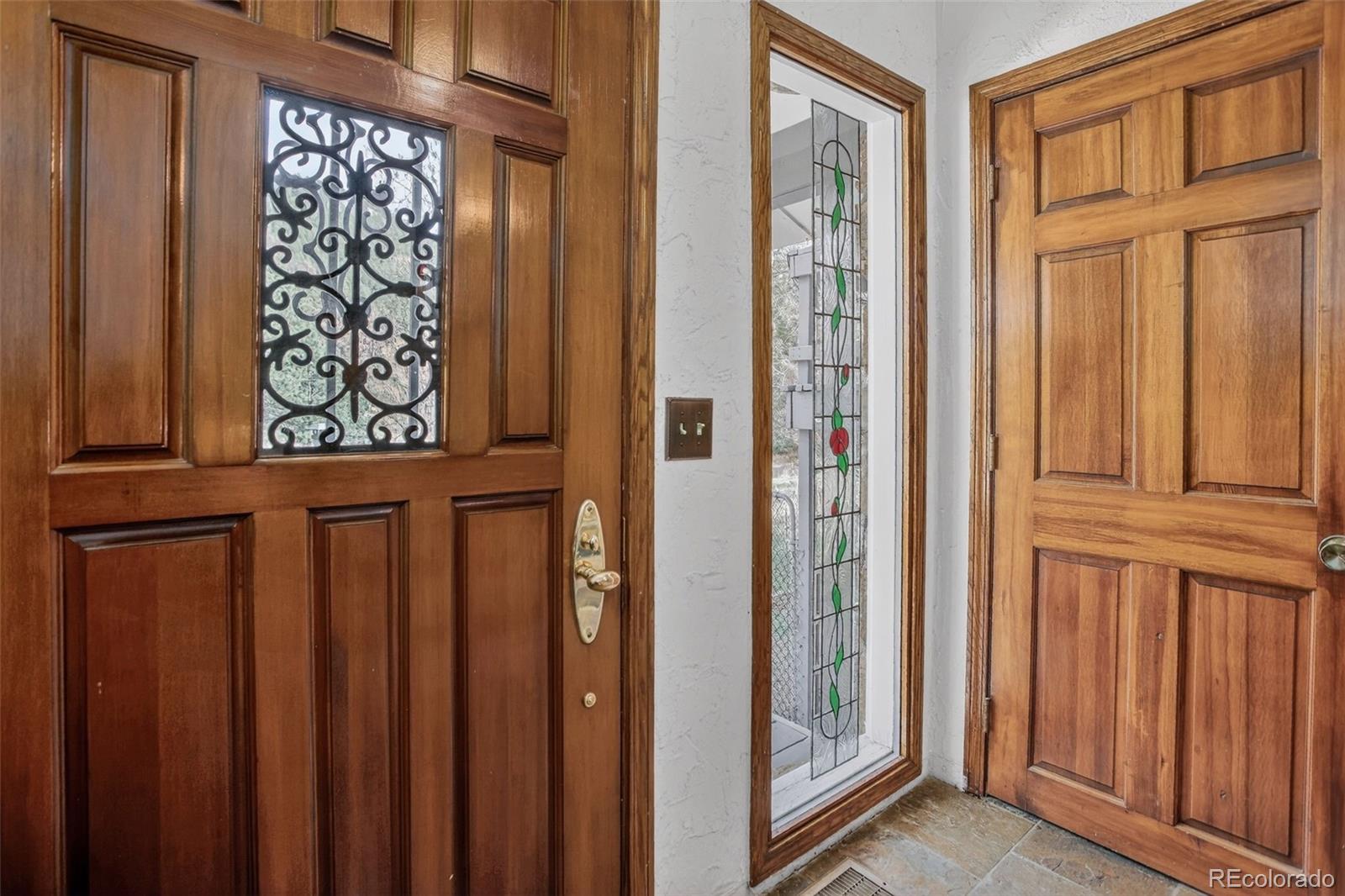 12699 South Foxton Road Conifer, CO 80433 - Photo 26 of 40 a view of front door