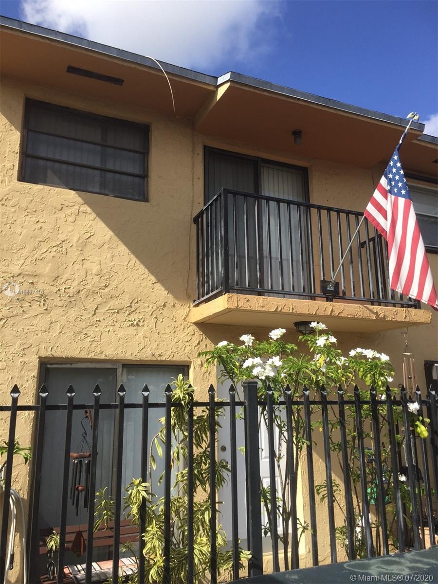6345 Southwest 138th Court, Unit 110 Miami, FL 33183 - Photo 13 of 13 a view of outdoor space and yard