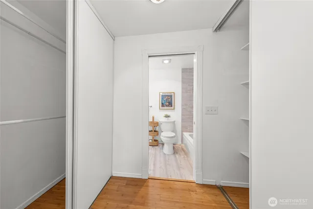 a view of a bedroom from a hallway