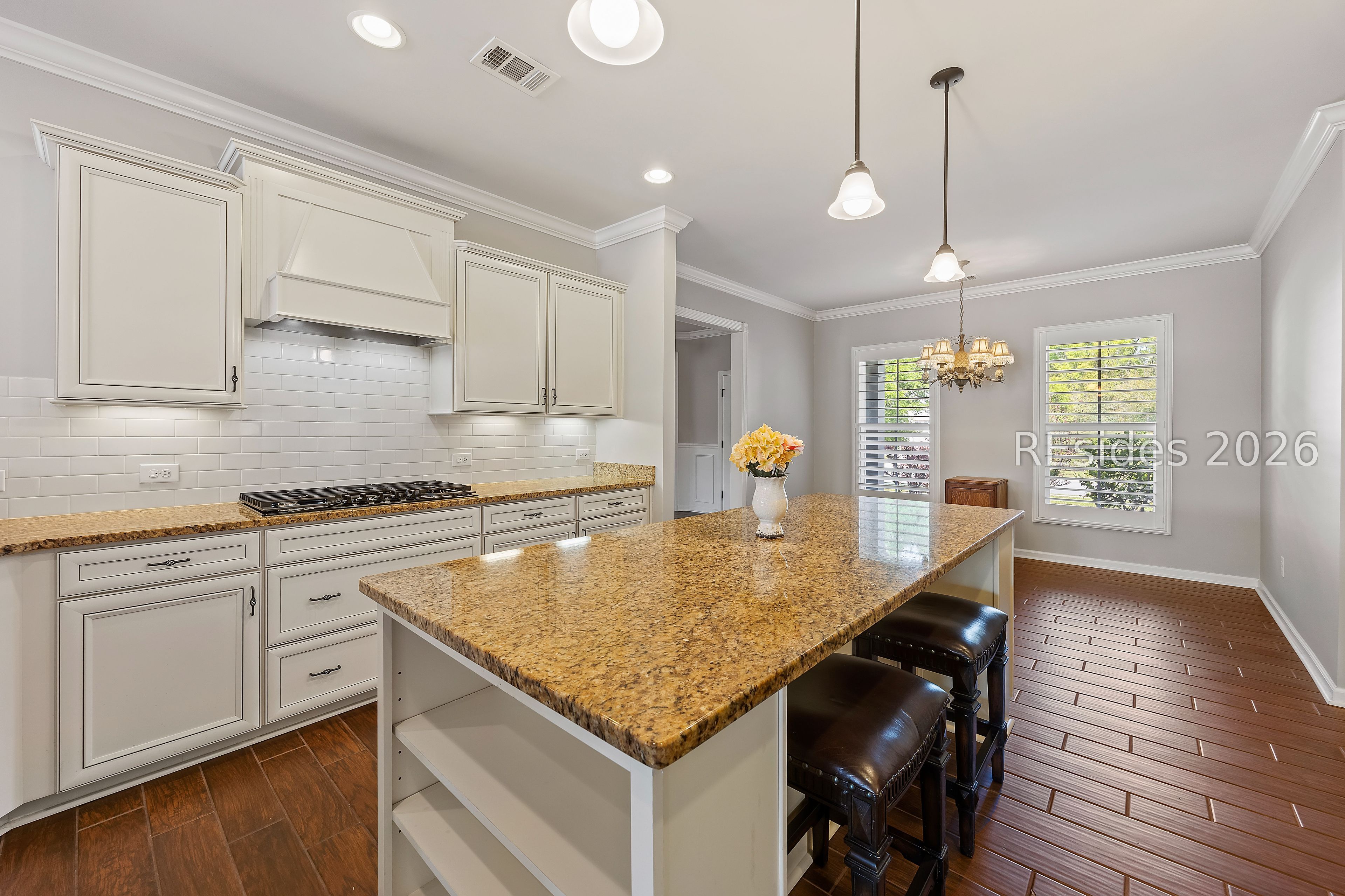 30 Heathrow Avenue Bluffton, SC 29910 - Photo 8 of 84 Breakfast bar plus island with seating.