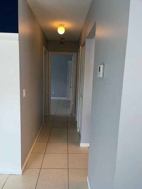 1180 Carlton Court, Unit 204B Fort Pierce, FL 34949 - Photo 12 of 19 a view of an empty room and window