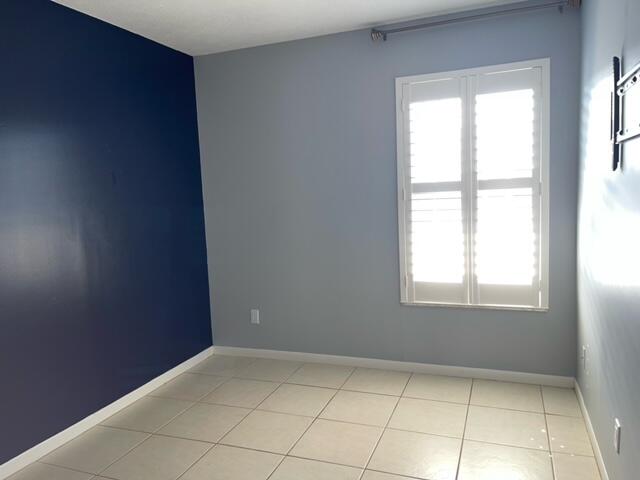 1180 Carlton Court, Unit 204B Fort Pierce, FL 34949 - Photo 13 of 19 an empty room with windows