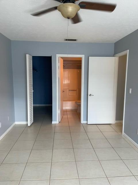 1180 Carlton Court, Unit 204B Fort Pierce, FL 34949 - Photo 16 of 19 a view of a hallway to rooms