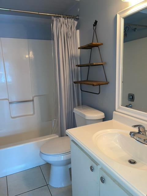 1180 Carlton Court, Unit 204B Fort Pierce, FL 34949 - Photo 18 of 19 a bathroom with a sink a toilet and shower